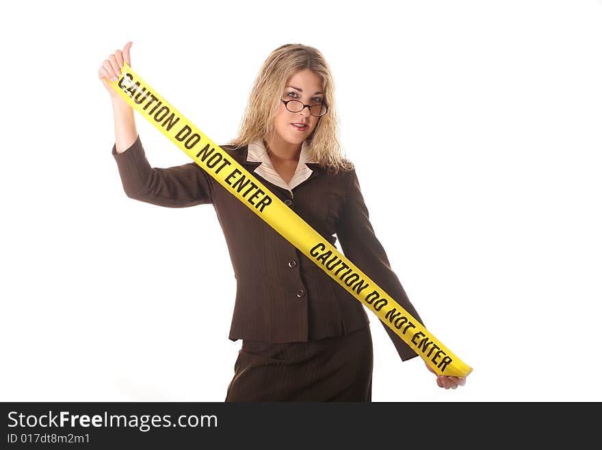 Sexy woman holding caution tape