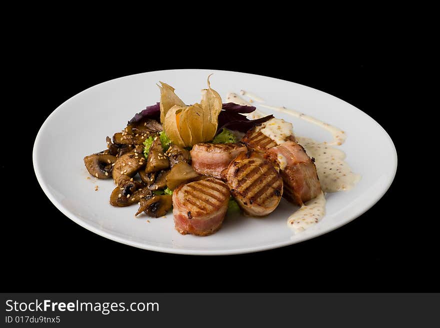 Cooked meat on white plate