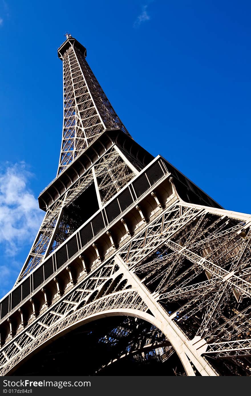 Classical beautiful view of The Eiffel Tower in Paris on a sunny day