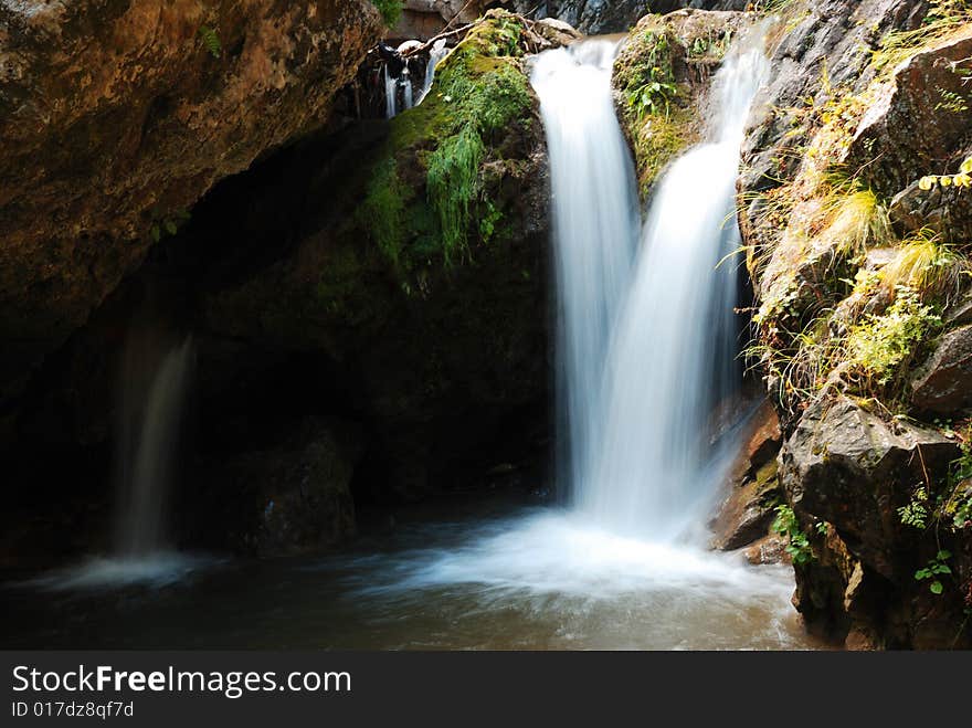 Honey Falls in mountains on Caucasus