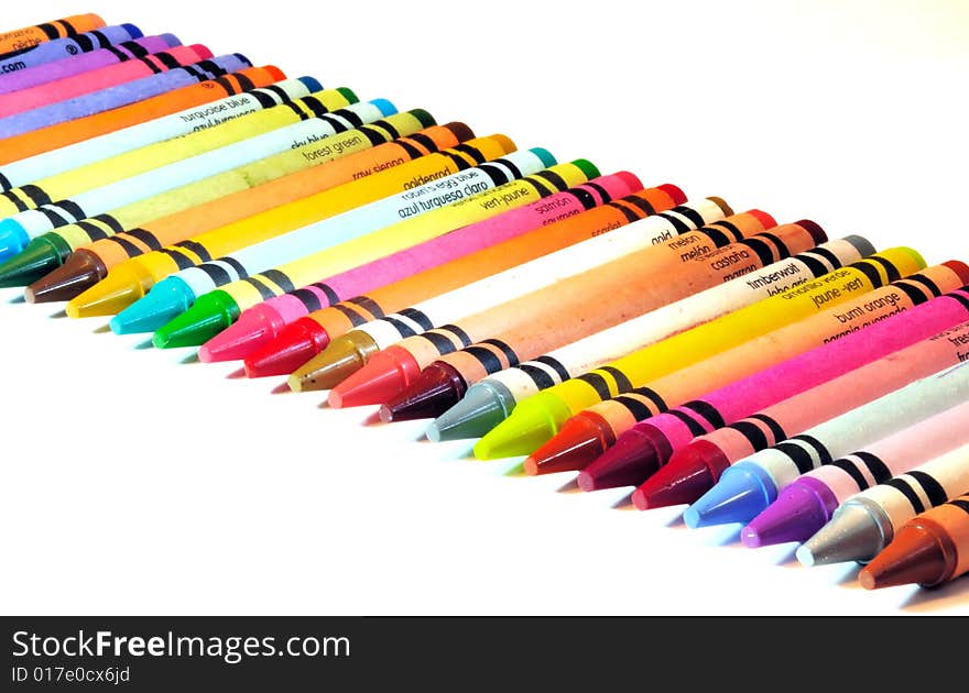 Color crayons in a straight line with hight depth of field - focus throughout.