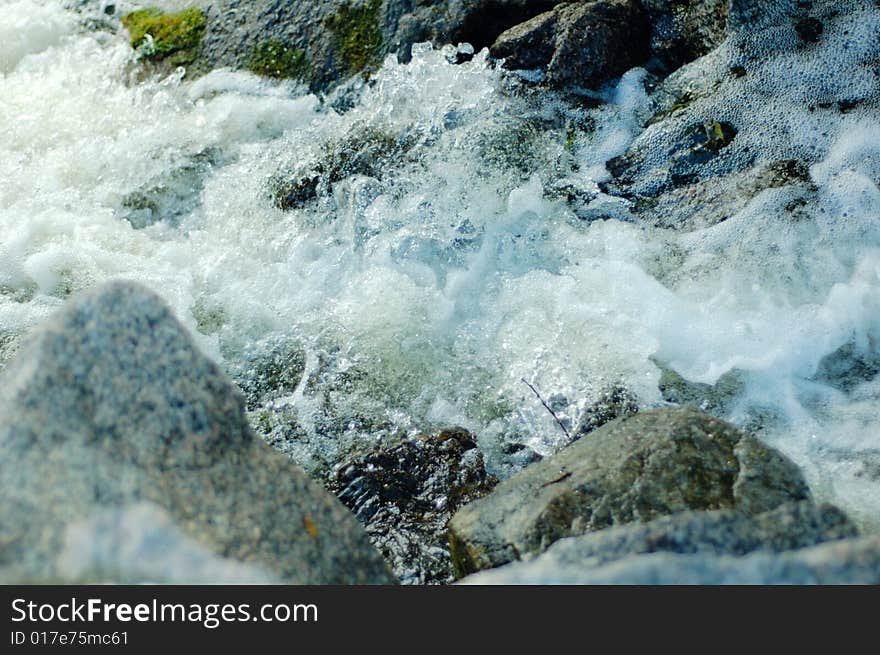 The rapid river and stone