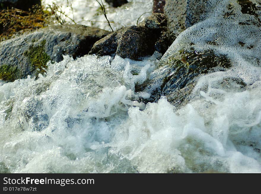 The rapid river and stone