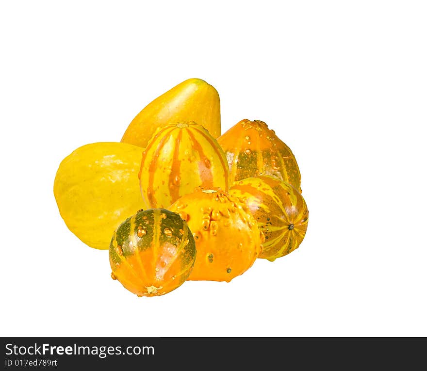 A grouping of seven gourds against white background with clipping path