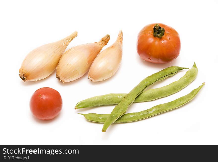 Isolated colored vegetables on white. Isolated colored vegetables on white