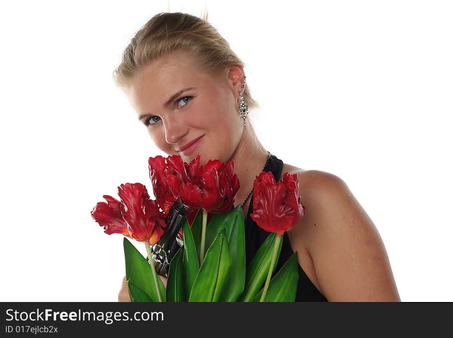 Woman with tulips and revolver isolated on white background