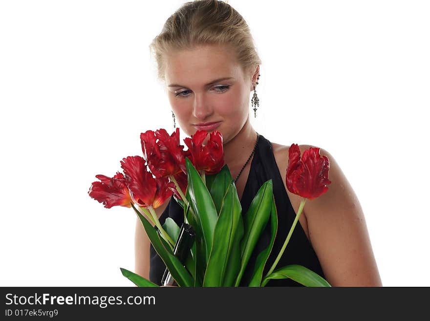 Woman with tulips and revolver isolated on white background