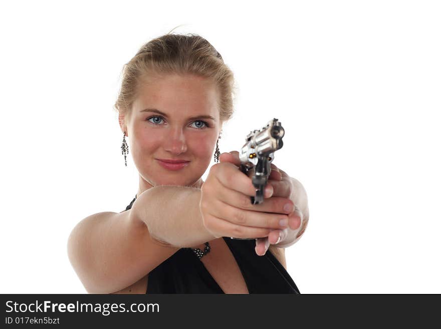 Young blond woman in black dress with revolver isolated on white background. Young blond woman in black dress with revolver isolated on white background