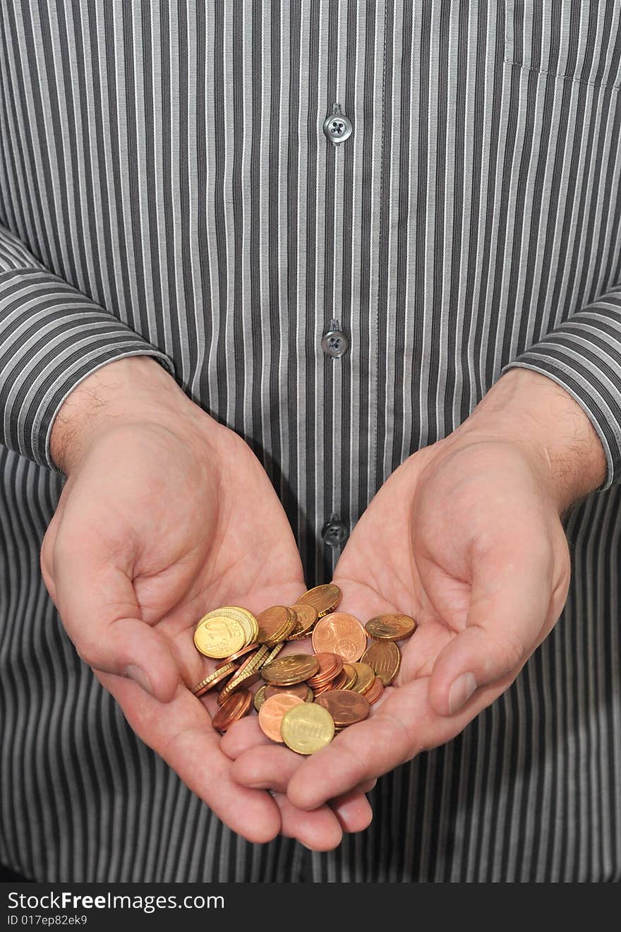 Man s hands with coins