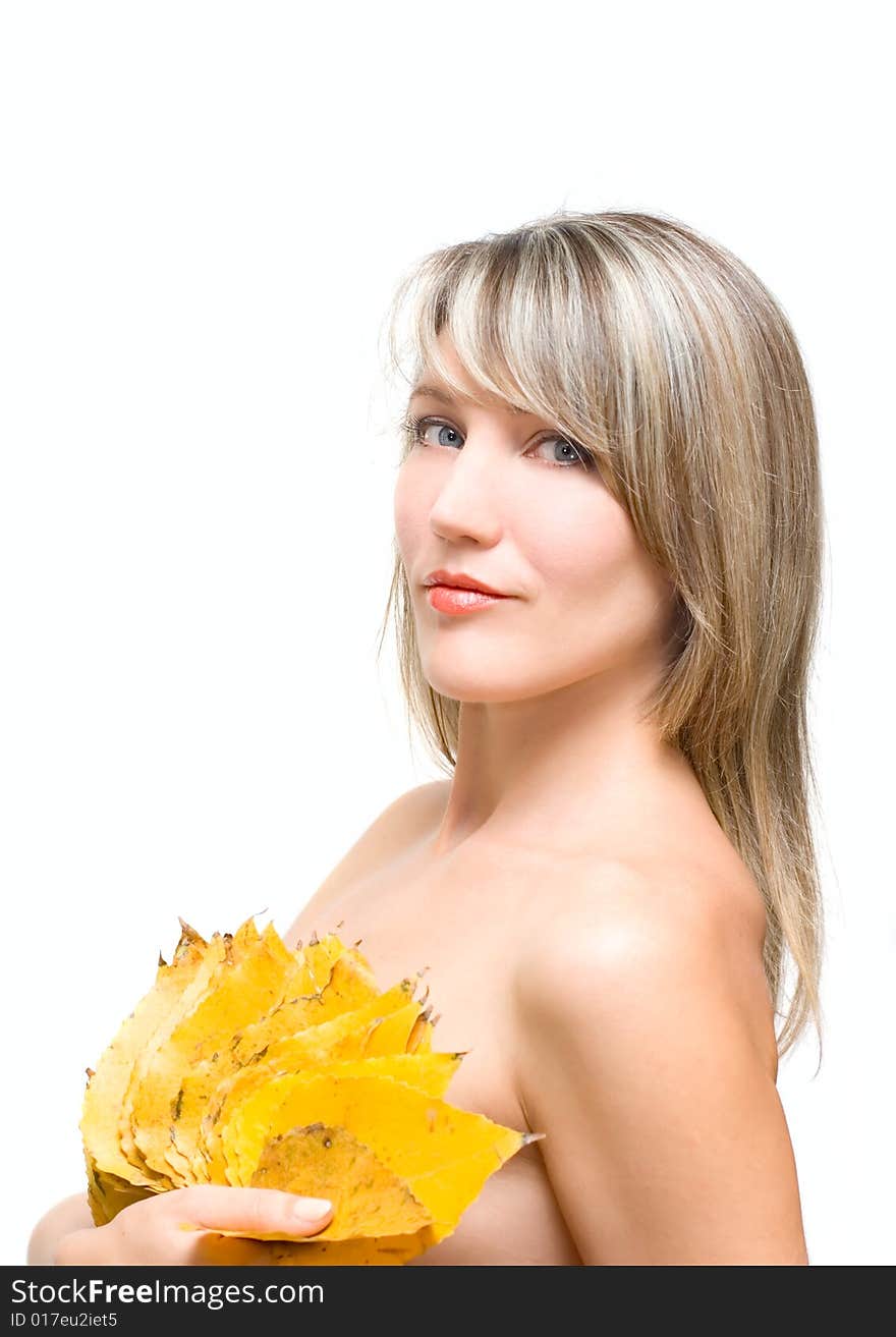 Portrait young woman with fall leafs