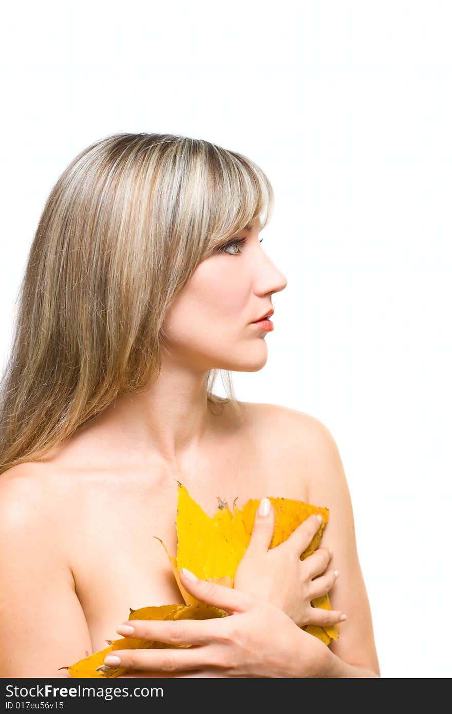 Portrait young woman with fall leafs