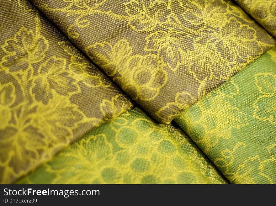 Green textile background close up