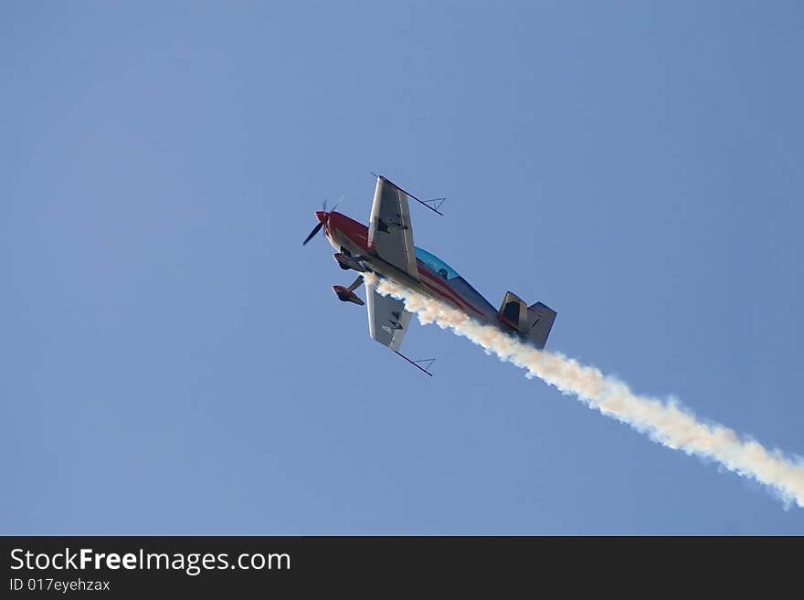 Airplane in the blue sky