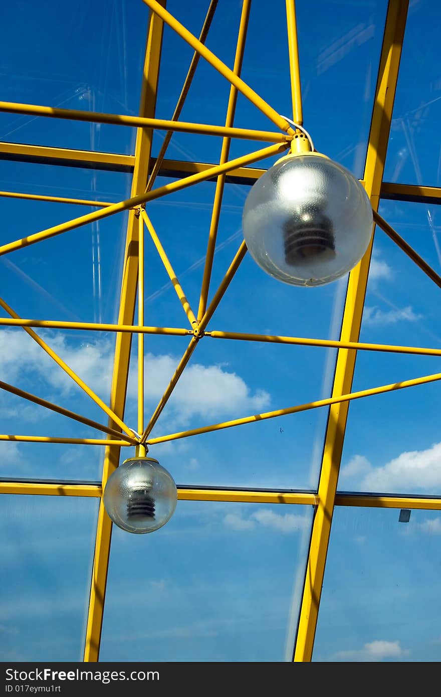 Light lamps in a corridor on a bridge. Light lamps in a corridor on a bridge