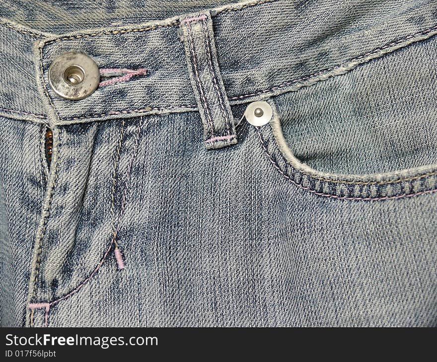 Jeans front pocket and zipper closeup