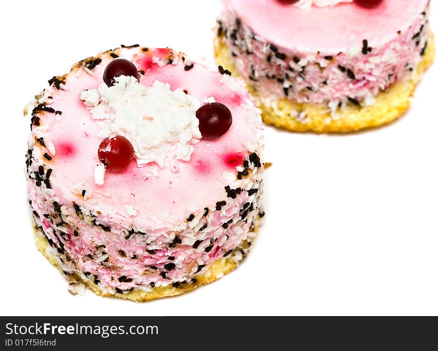 Pink cakes on white background