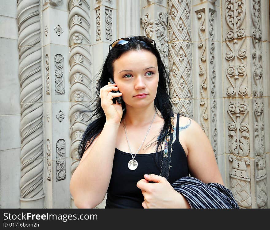 Beautiful young woman on the phone