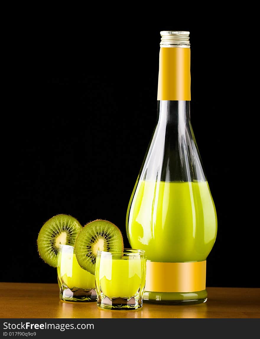 Bottle And Glass With Kiwi