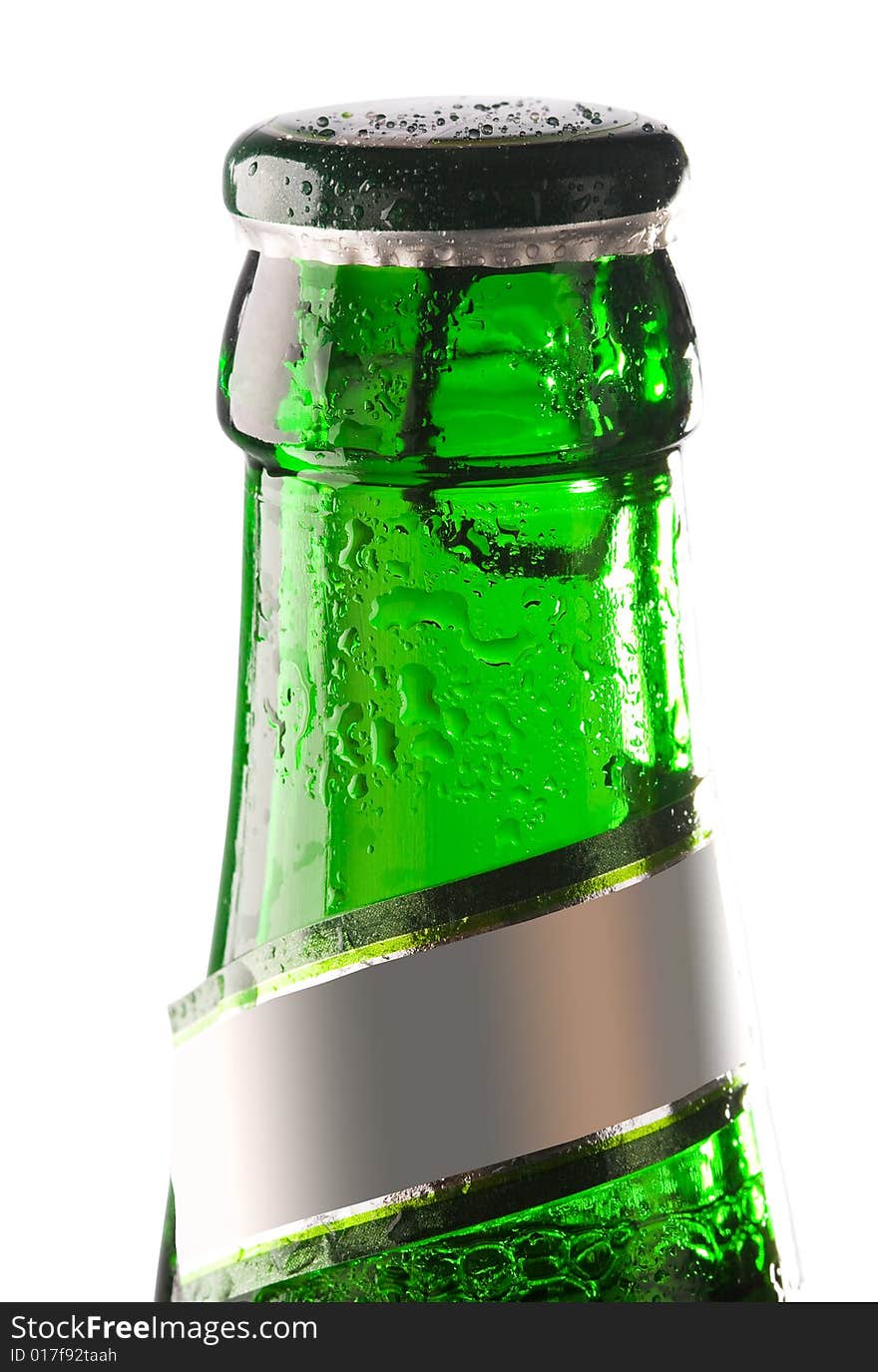 Green bottle of beer with water drops