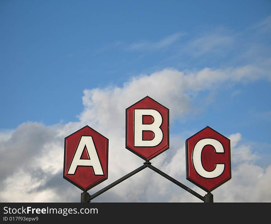 Red a b c sign and blue sky