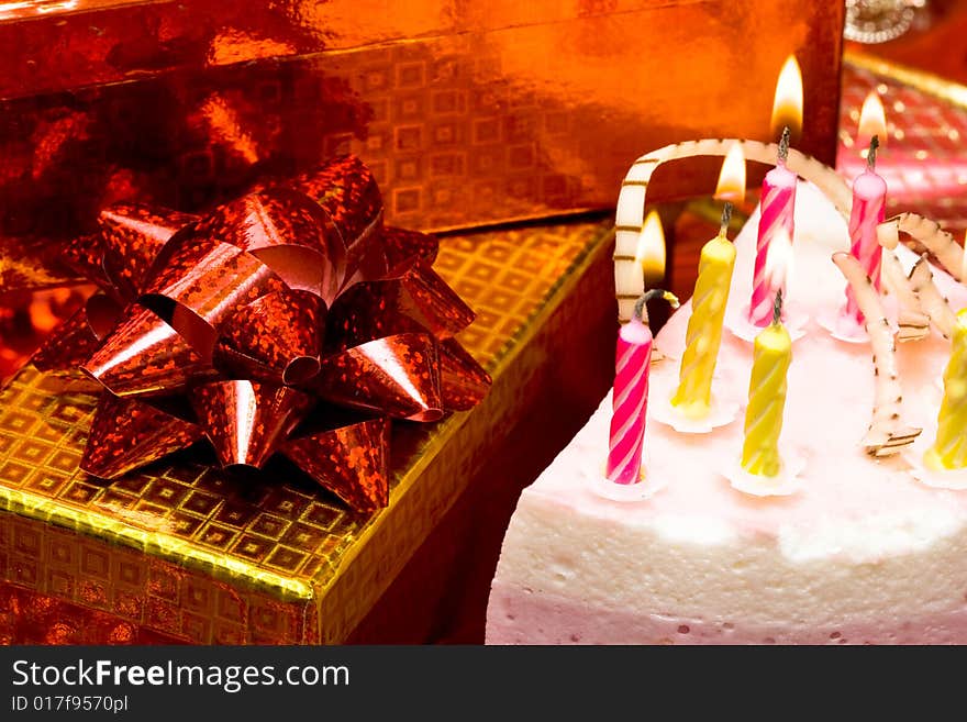 Cake and candles on celebratory table