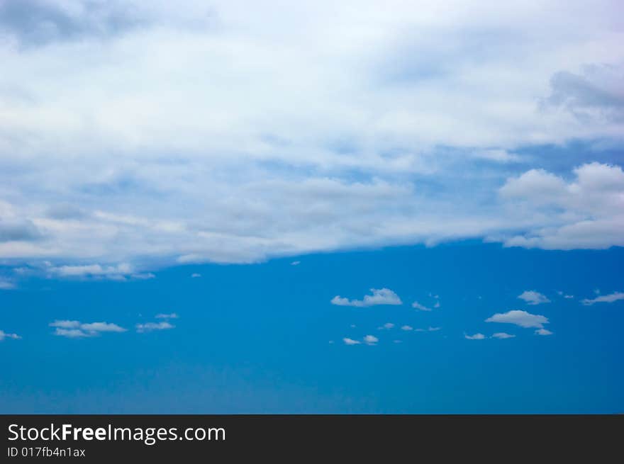 Horizontal clouds moving across a nice blue sky. Horizontal clouds moving across a nice blue sky