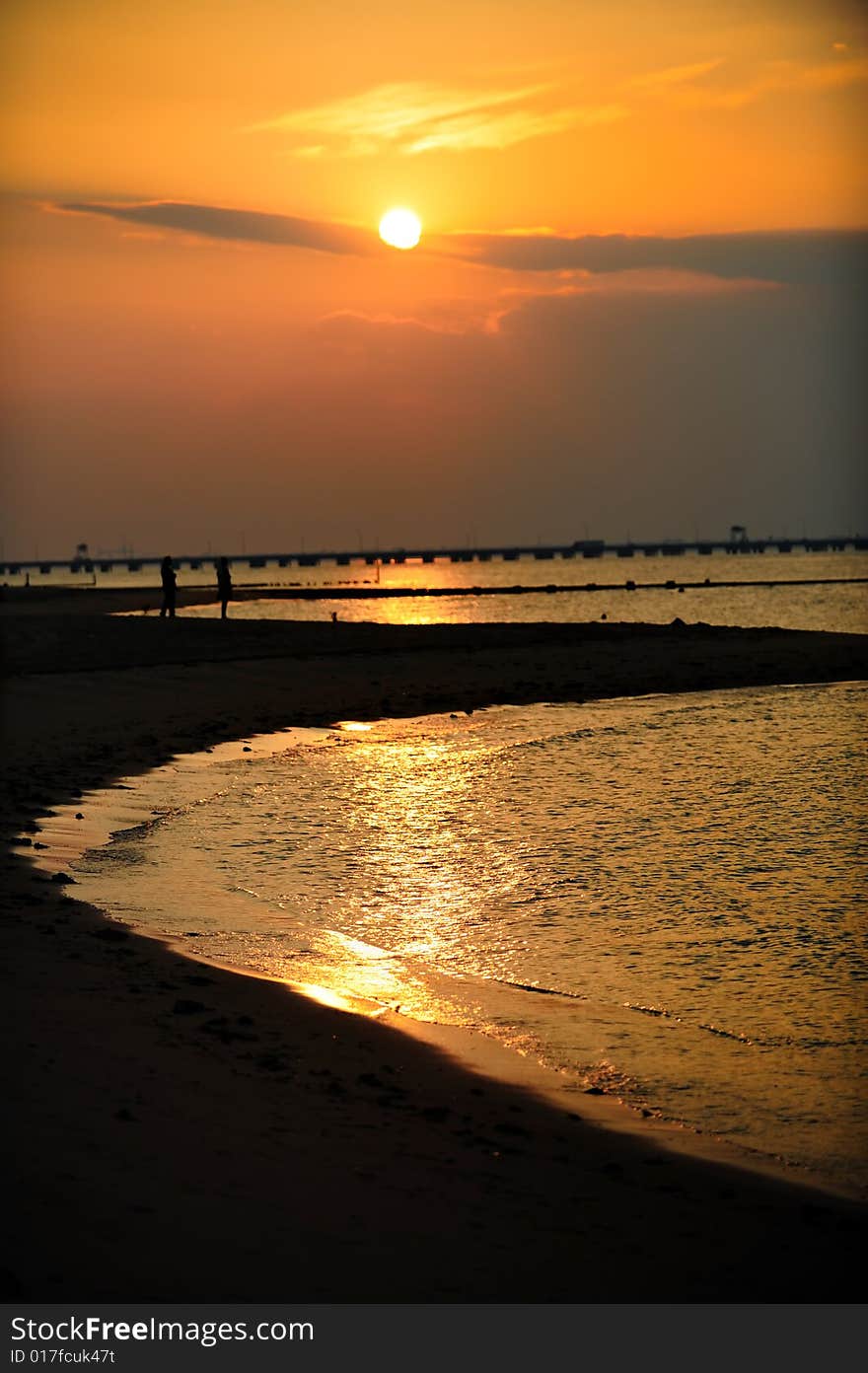 Sunset in orange tones in an ocean gulf. Sunset in orange tones in an ocean gulf