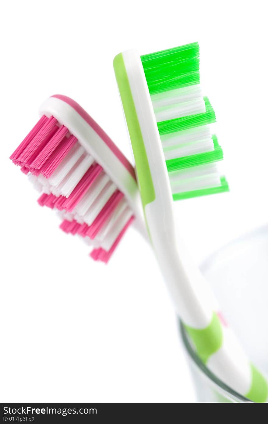 Two toothbrushes isolated over white