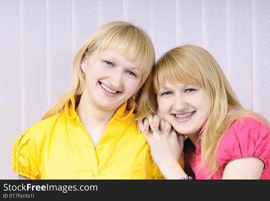 Portrait of two attractive blond sisters. Portrait of two attractive blond sisters