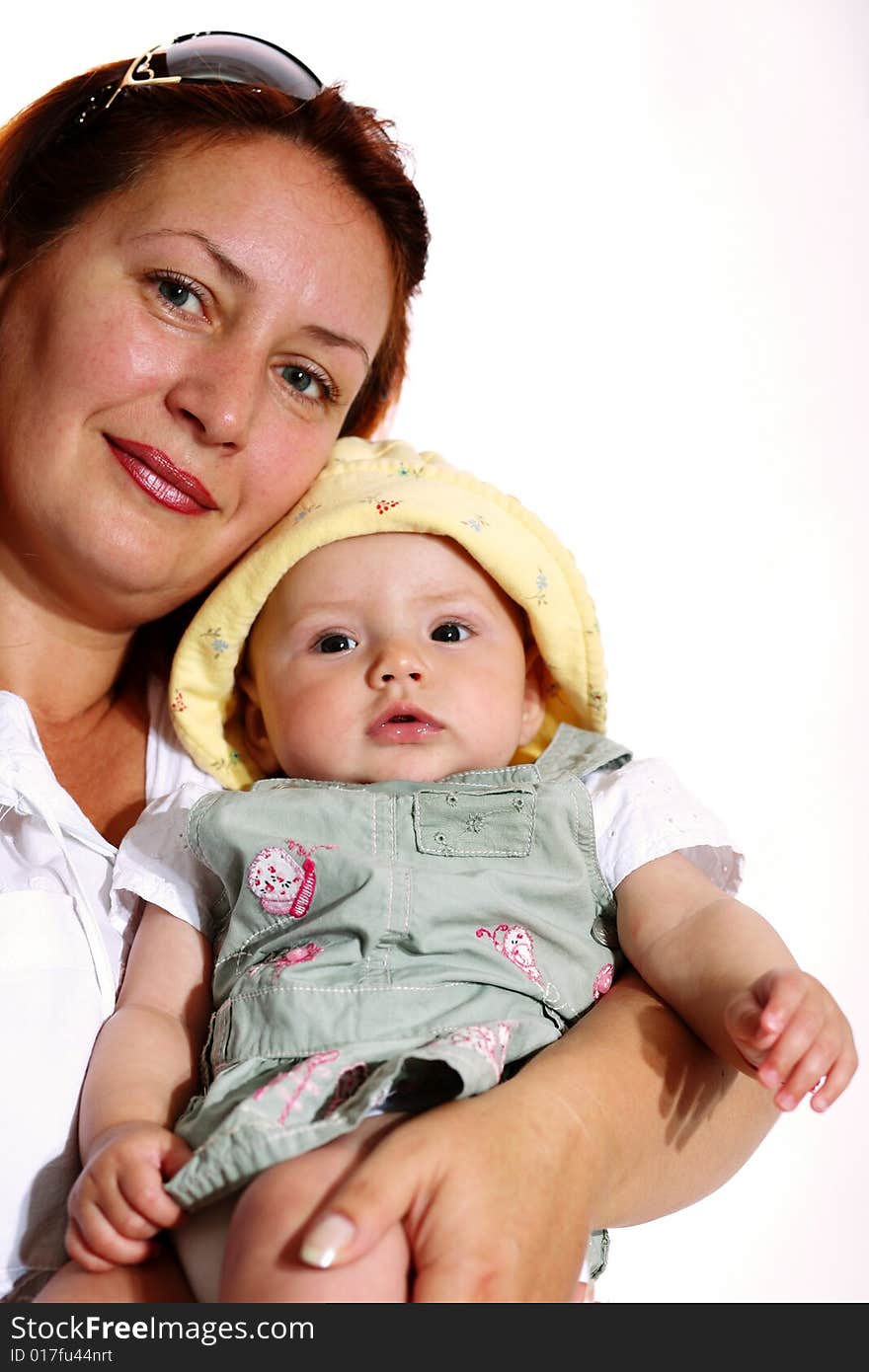 A woman with a baby in her hands. A woman with a baby in her hands