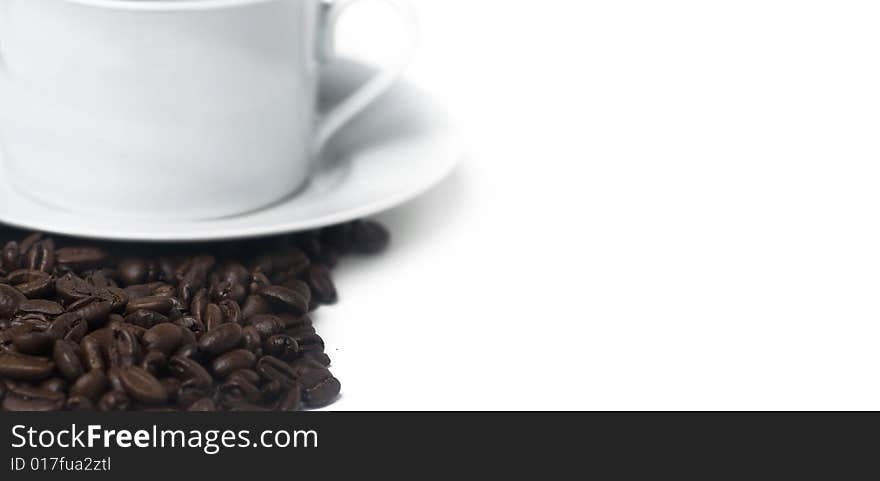 Coffee Beans And Cup And Saucer