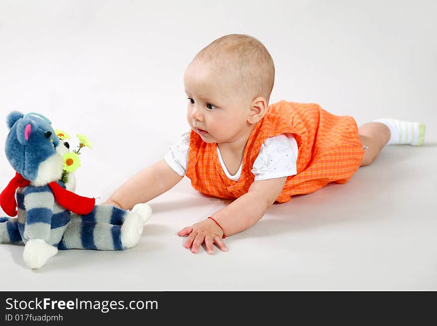 An image of cute baby in a studio. An image of cute baby in a studio