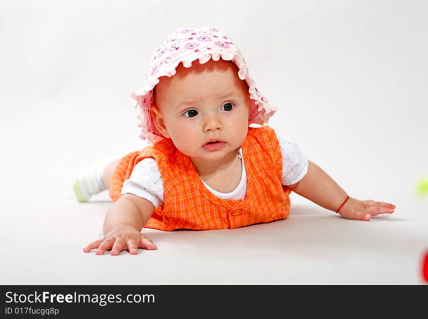 An image of cute baby in a studio. An image of cute baby in a studio