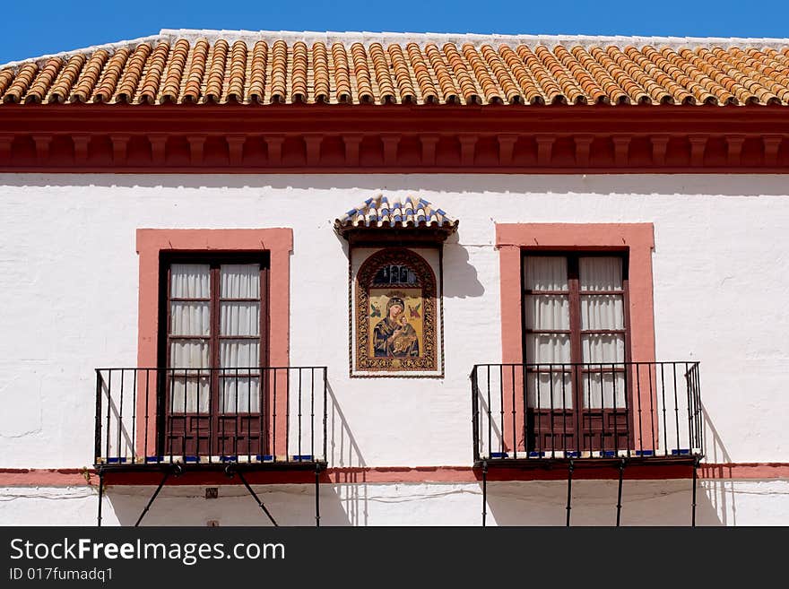 Typical front of a building and windows in Carmona, Andalusia. Typical front of a building and windows in Carmona, Andalusia