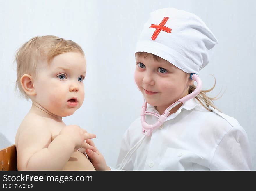 An image of child playing in doctor. An image of child playing in doctor