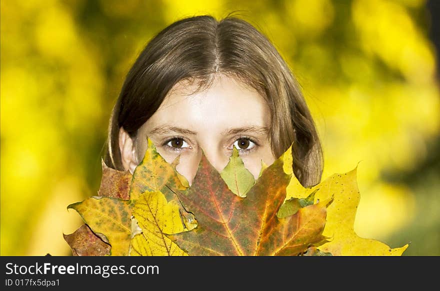 Beautifull blonde girl with maple leaves. Beautifull blonde girl with maple leaves