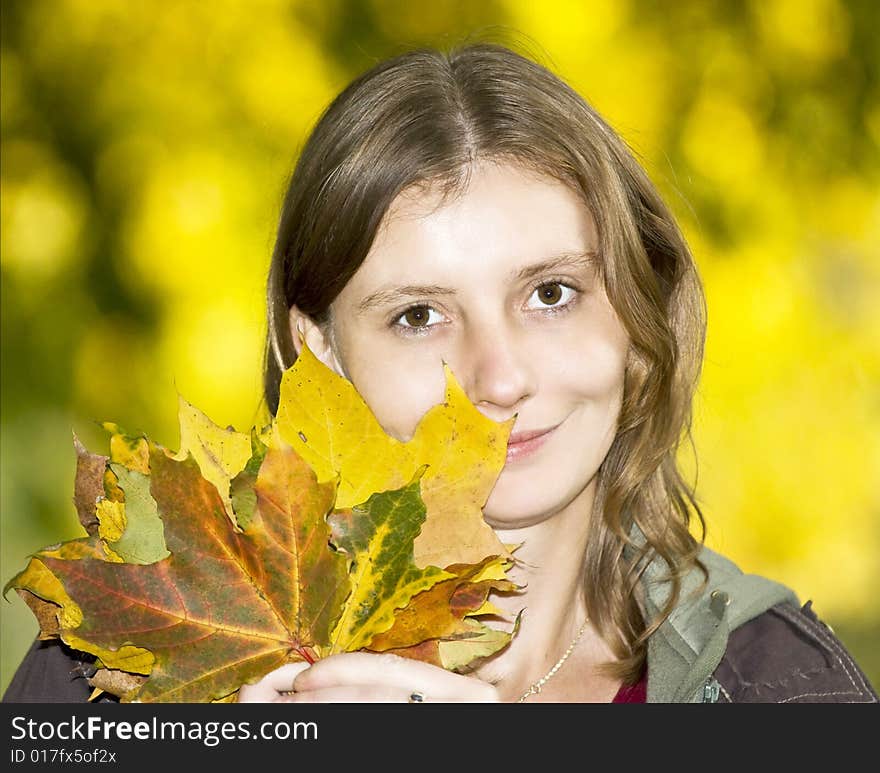 Beautifull blonde girl with maple leaves. Beautifull blonde girl with maple leaves