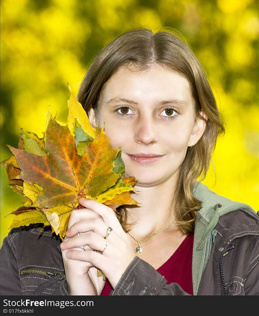 Beautifull blonde girl with maple leaves. Beautifull blonde girl with maple leaves