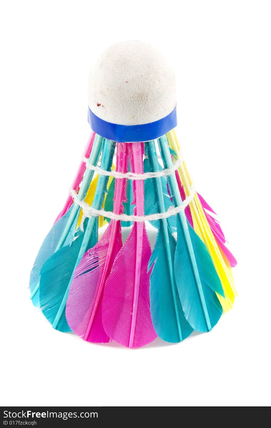 A colourful shuttlecock with feathers on the white background