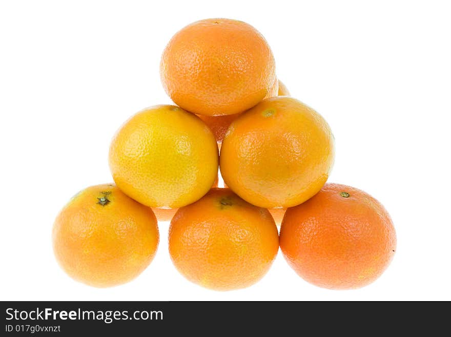 Pyramid of tangerines on white. Pyramid of tangerines on white.