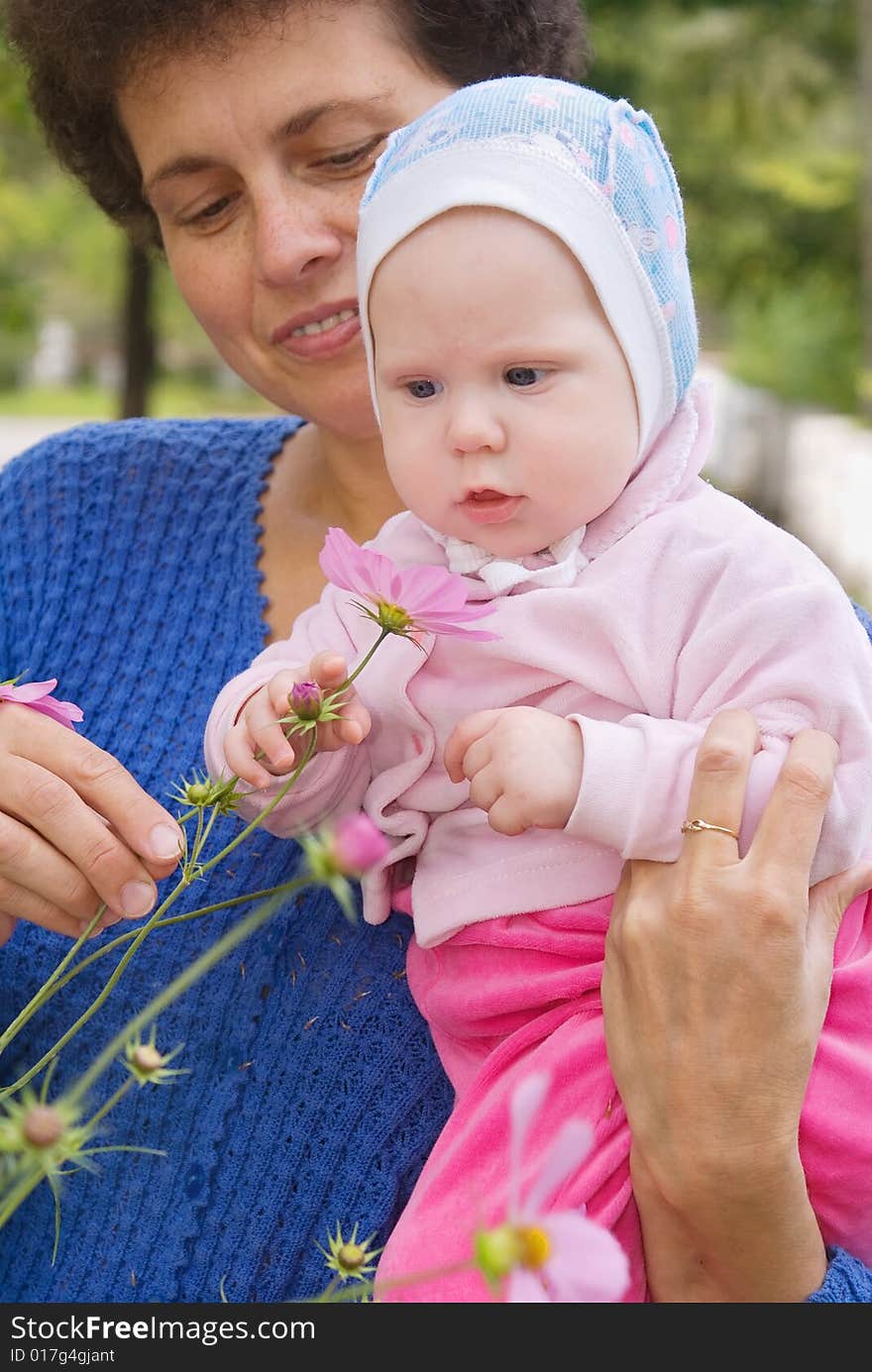 The Child On Hands At Mum