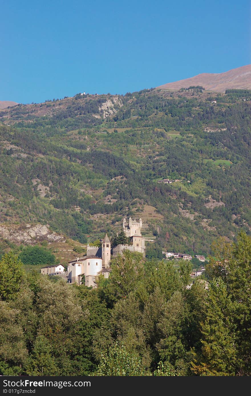 Medieval castle on hill in Italy, Aosta region, vertical. Medieval castle on hill in Italy, Aosta region, vertical