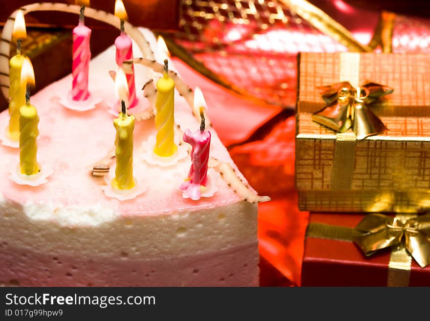 Cake and candles on celebratory table