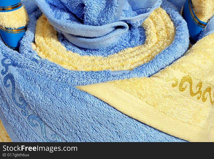 Fresh soft bath towels in roll decoration. Fresh soft bath towels in roll decoration