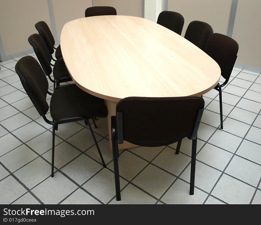 Office meeting room table with chairs