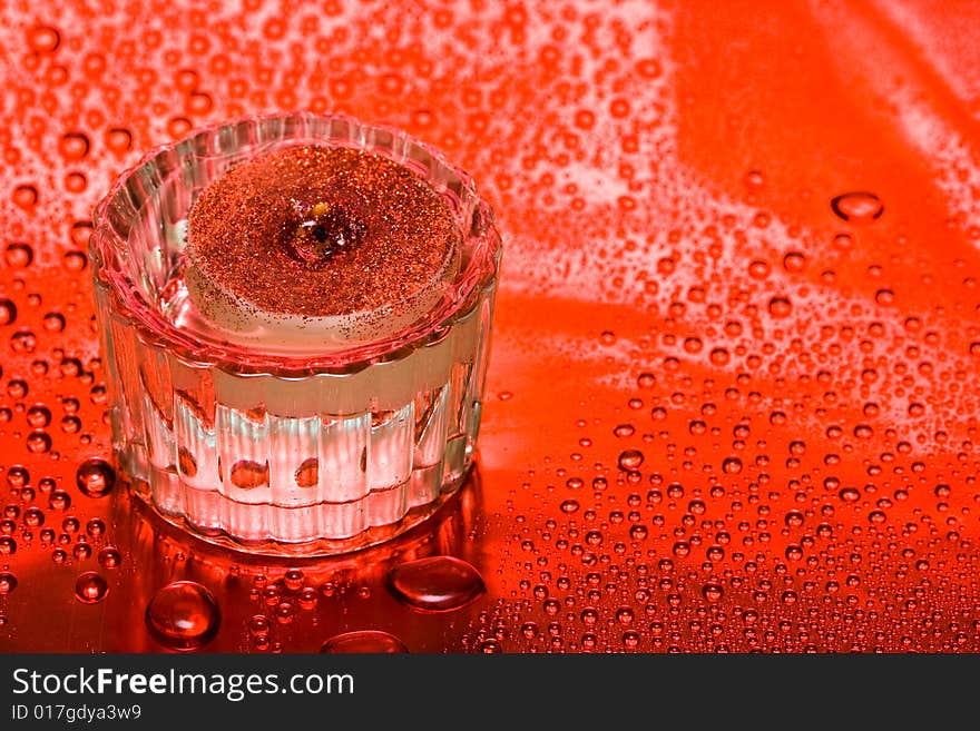 Candle and water drops