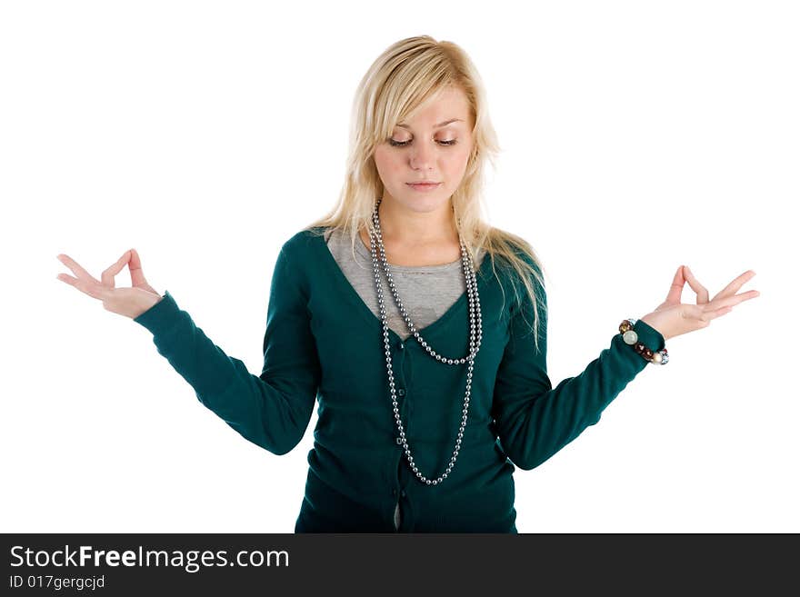 Beautiful young woman meditating isolated. Beautiful young woman meditating isolated