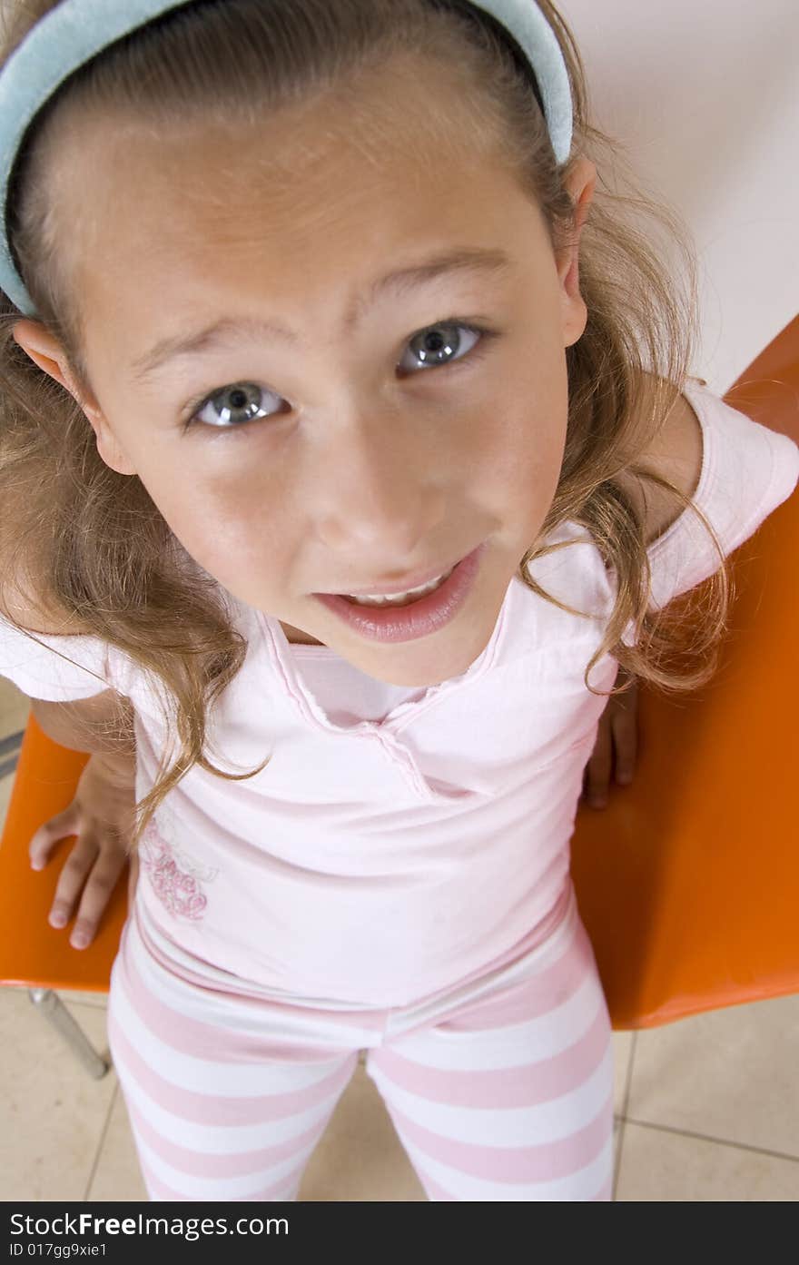 Aerial view of smiling little girl