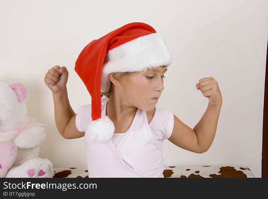 Little Girl Wearing Christmas Hat