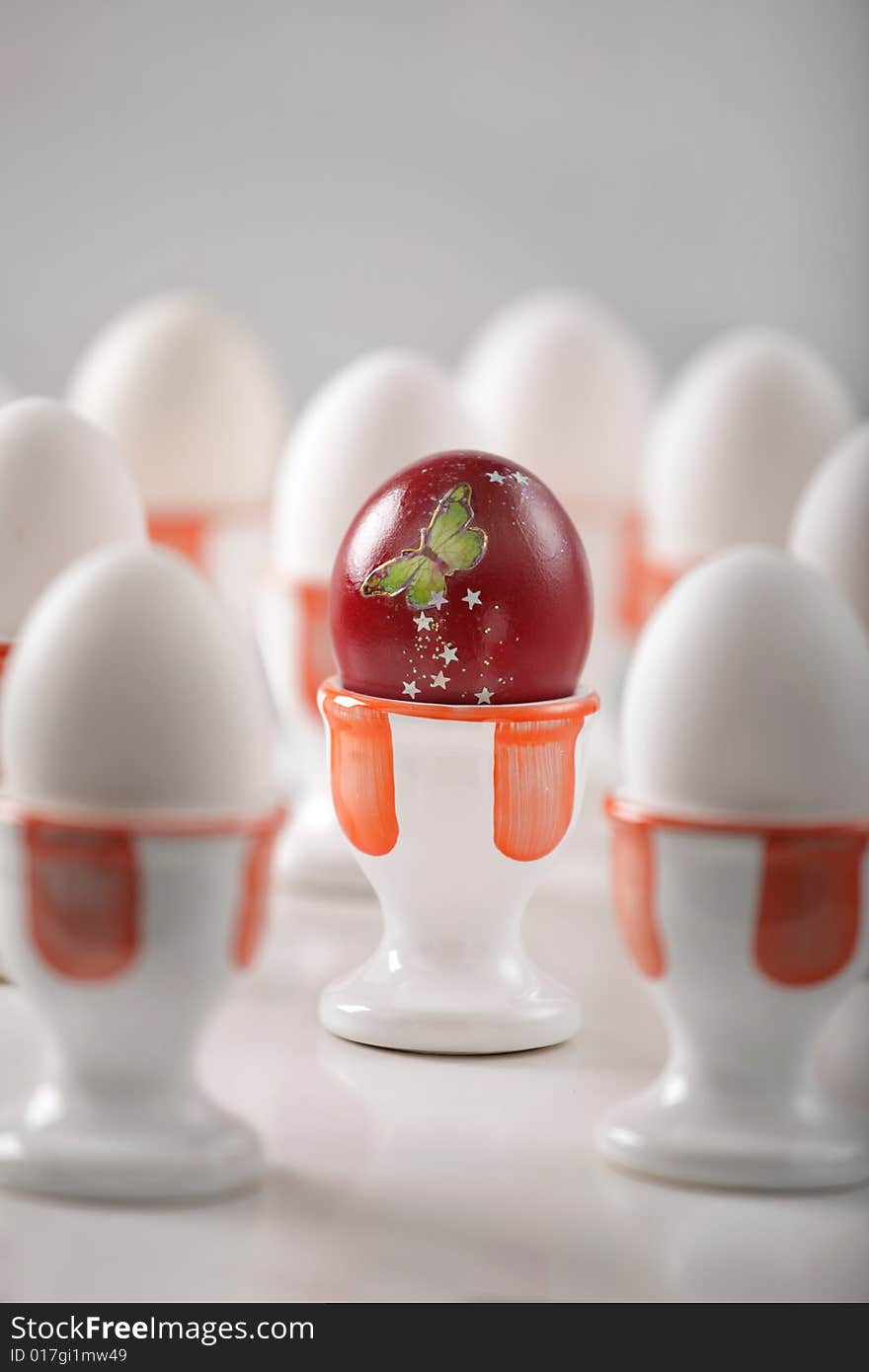 Red Egg With Dozen White Eggs